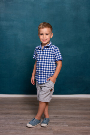 Photo of boy posing in studio in Ocoee Florida. Children photography